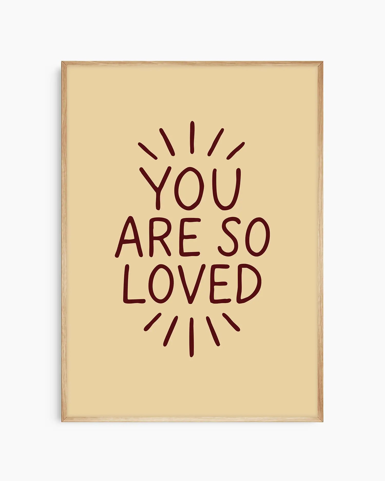 Children's poster with 'You are so loved' text framed in an oak frame.
