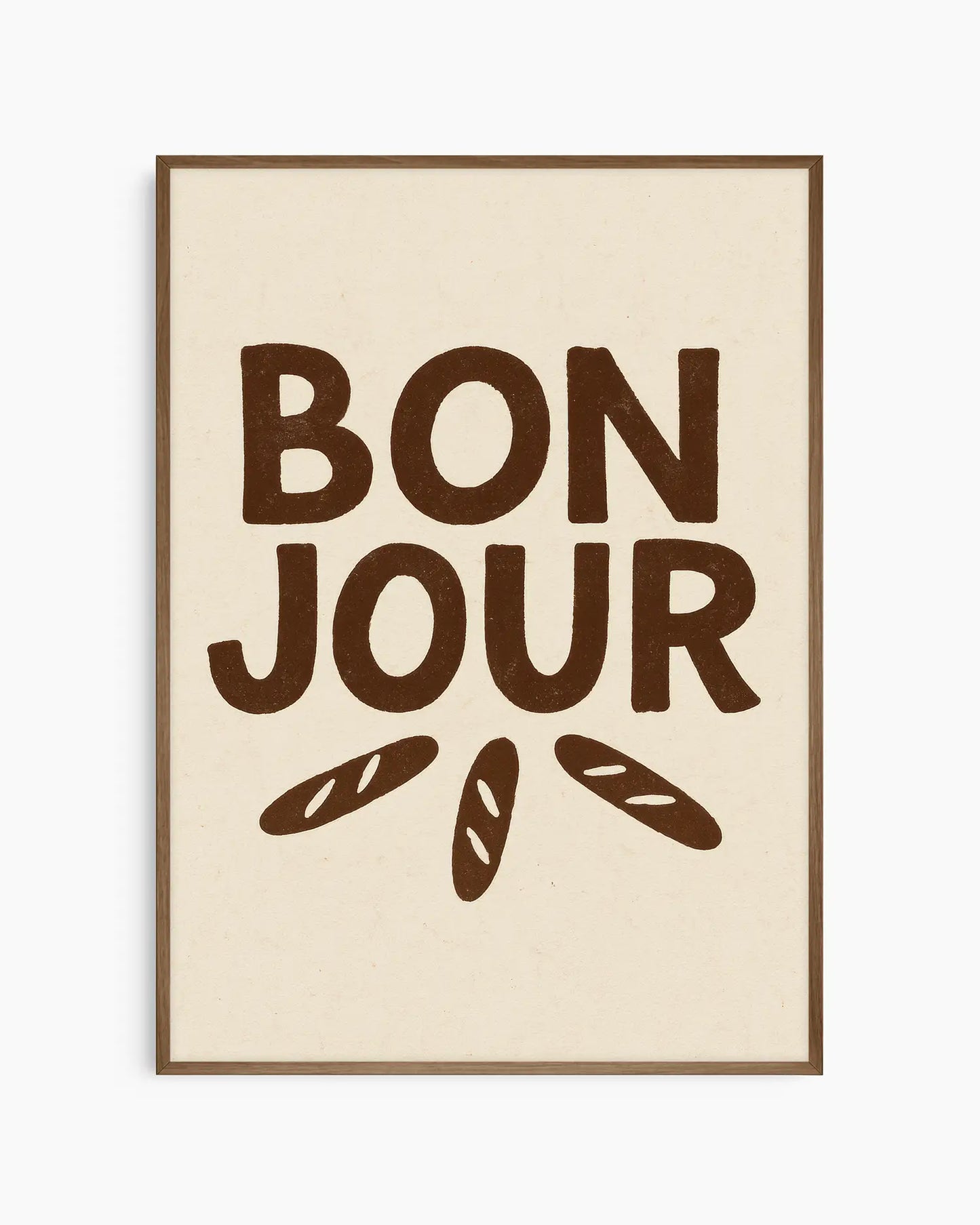 Beige poster with 'Bonjour' text and bread illustrations in brown framed in a dark oak frame.