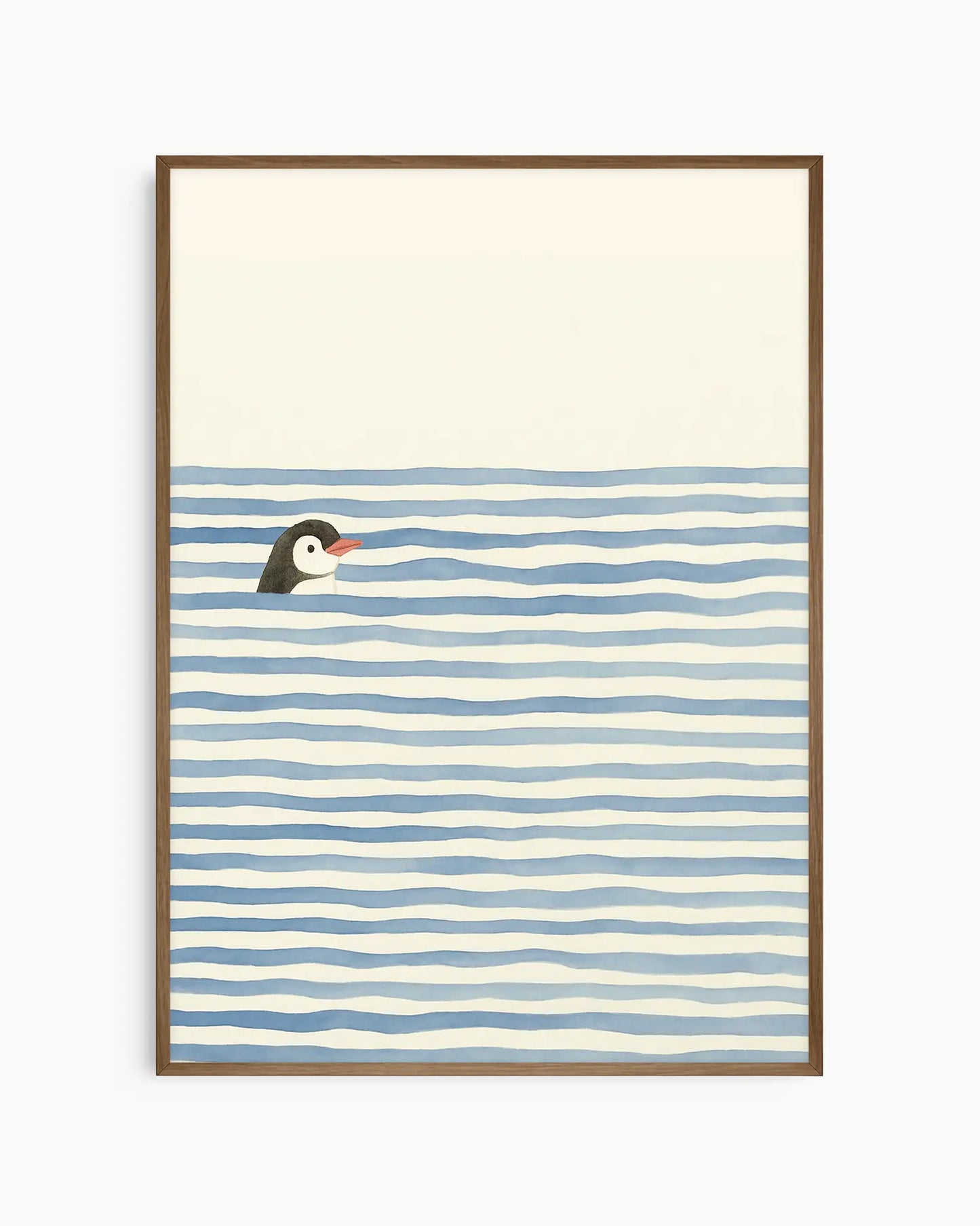 Children's poster of a swimming penguin with a dark oak frame.