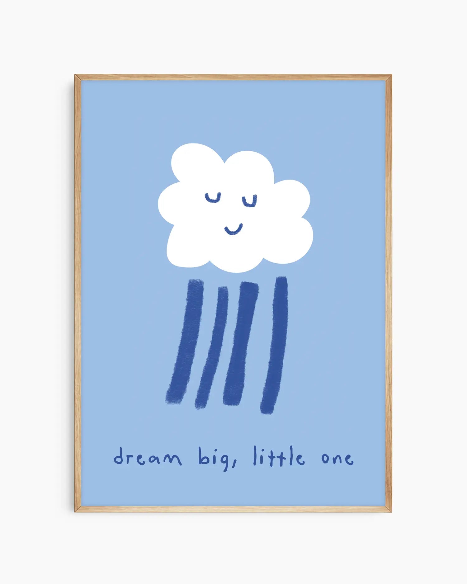 Blue poster of a white cloud with rain falling from it and the text 'dream big, little one' framed in an oak frame.