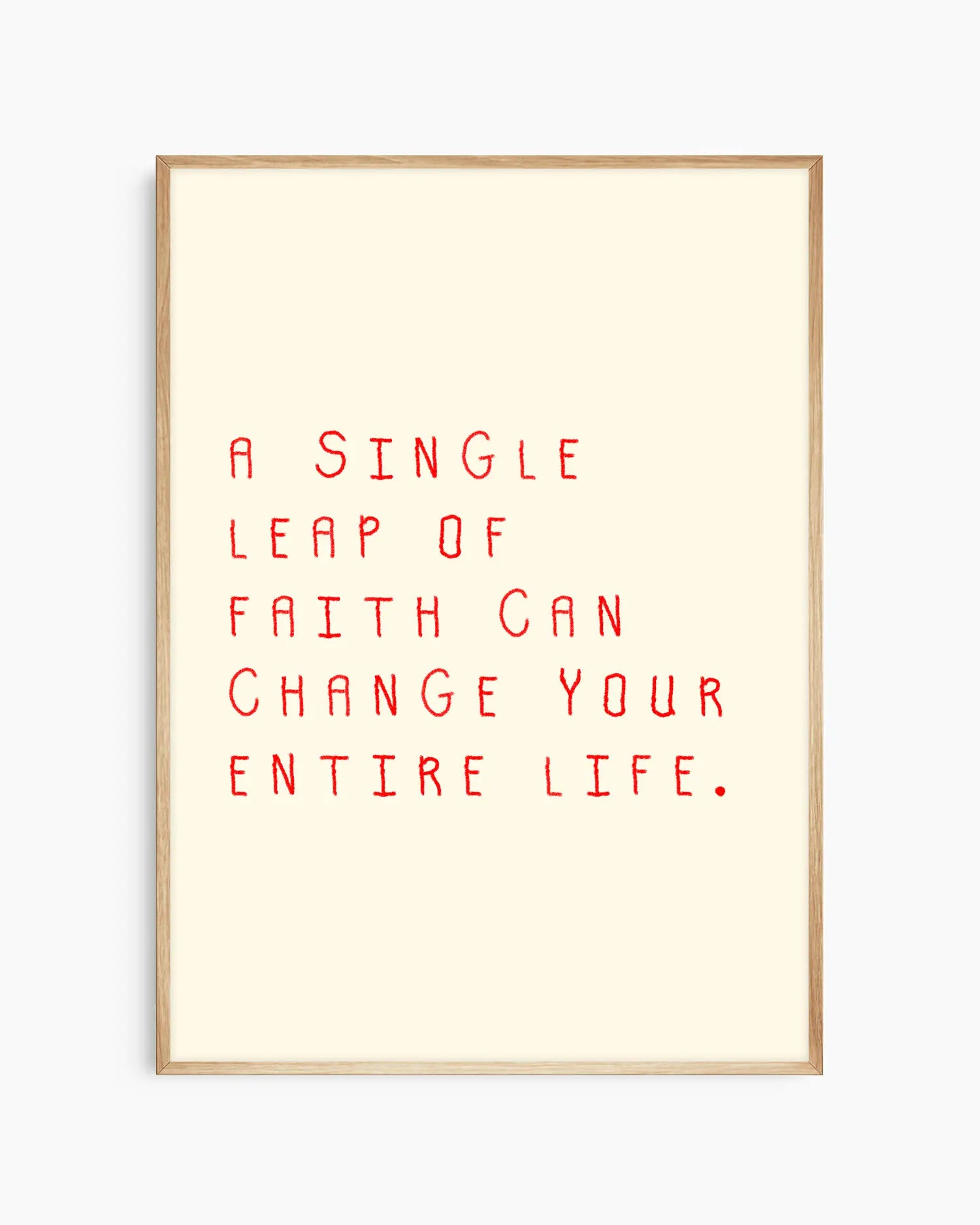 Nursery poster with the text 'A single leap of faith can change your entire life.' framed in an oak frame