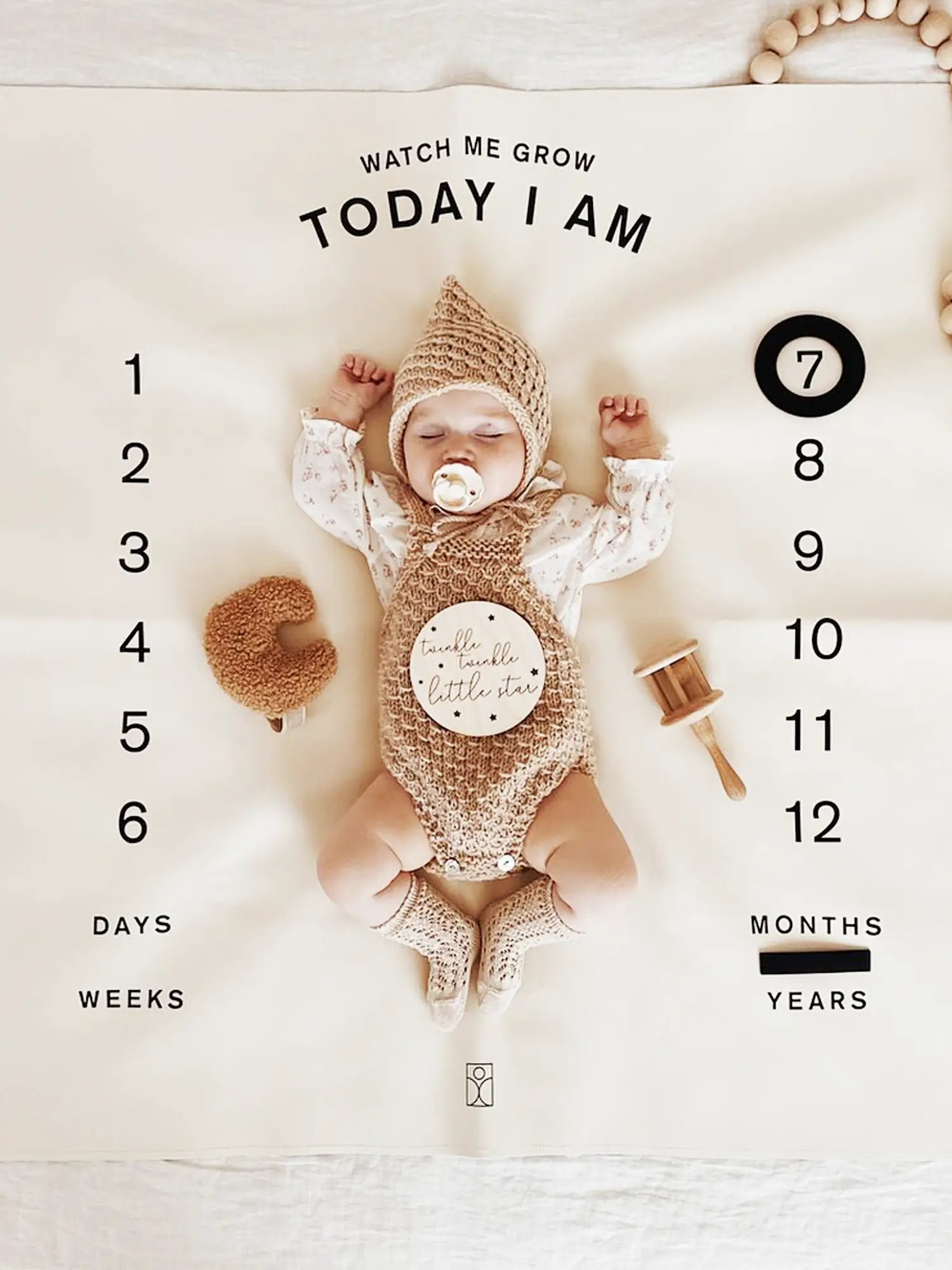 Soft and breathable milestone blanket for capturing monthly baby photos