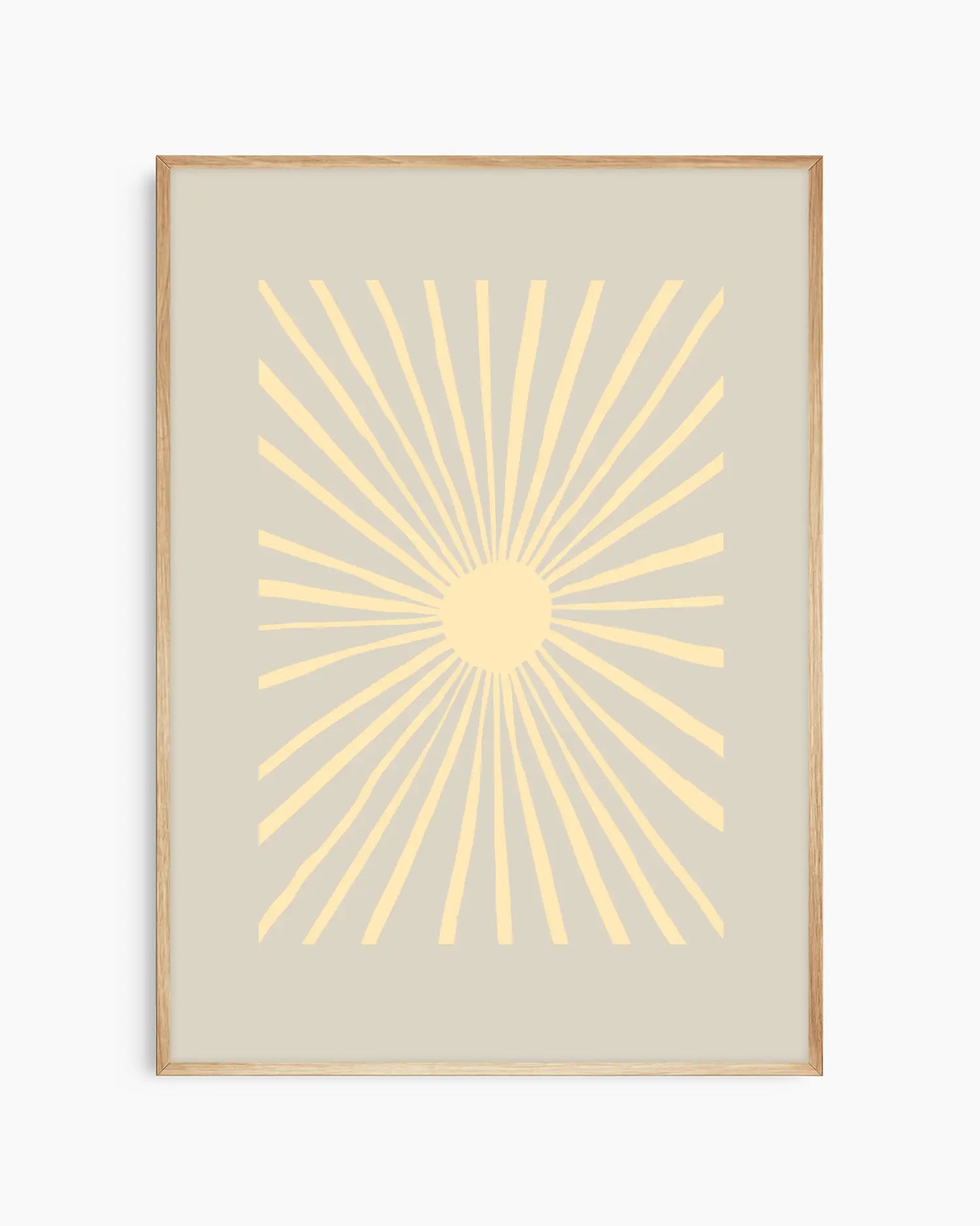 Framed artwork with a yellow sunburst design on a beige background