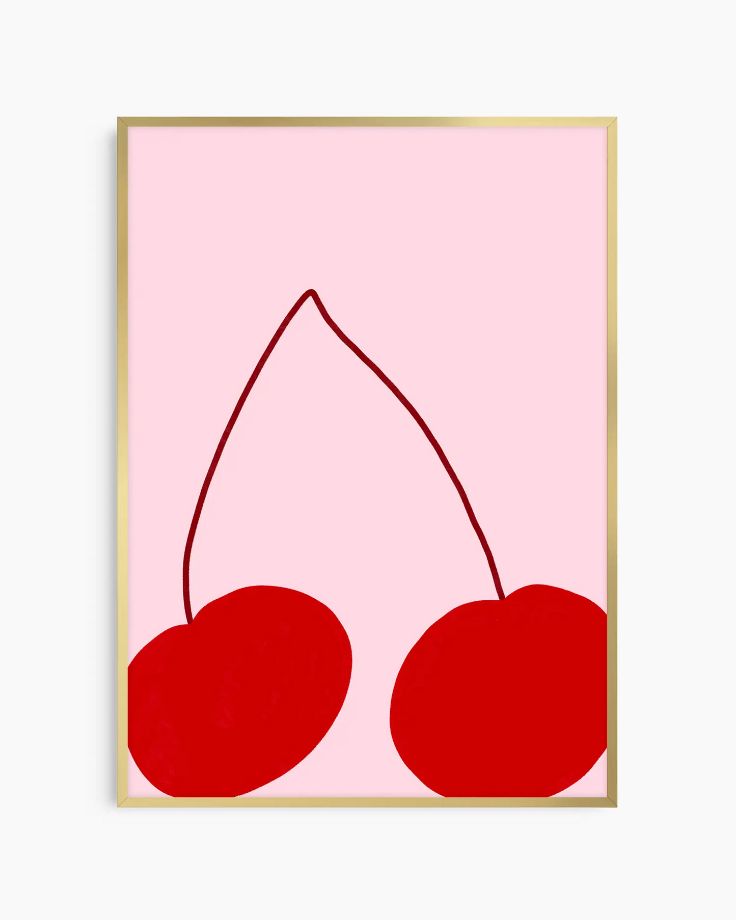 Framed artwork of two red cherries on a pink background