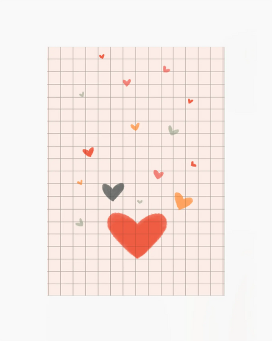Grid paper with colorful heart shapes on a white background