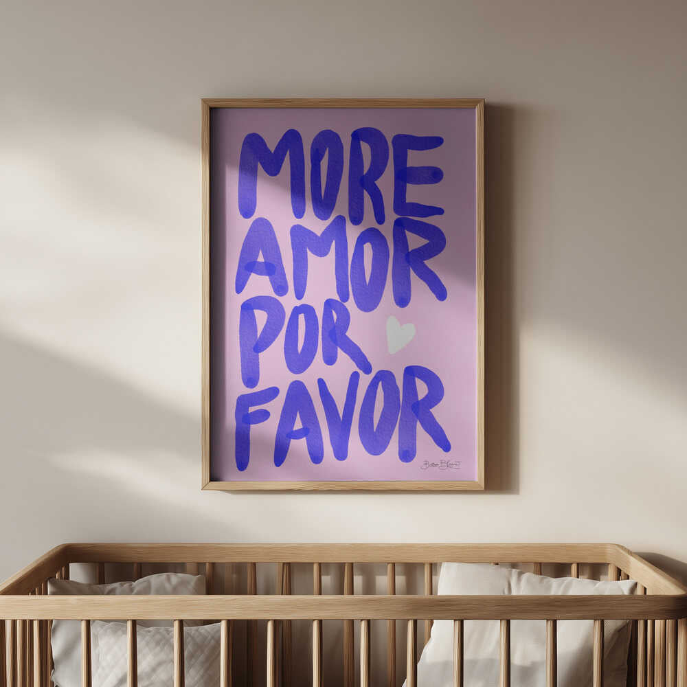 Framed nursery poster with purple text 'MORE AMOR POR FAVOR' hanging above the baby crib.
