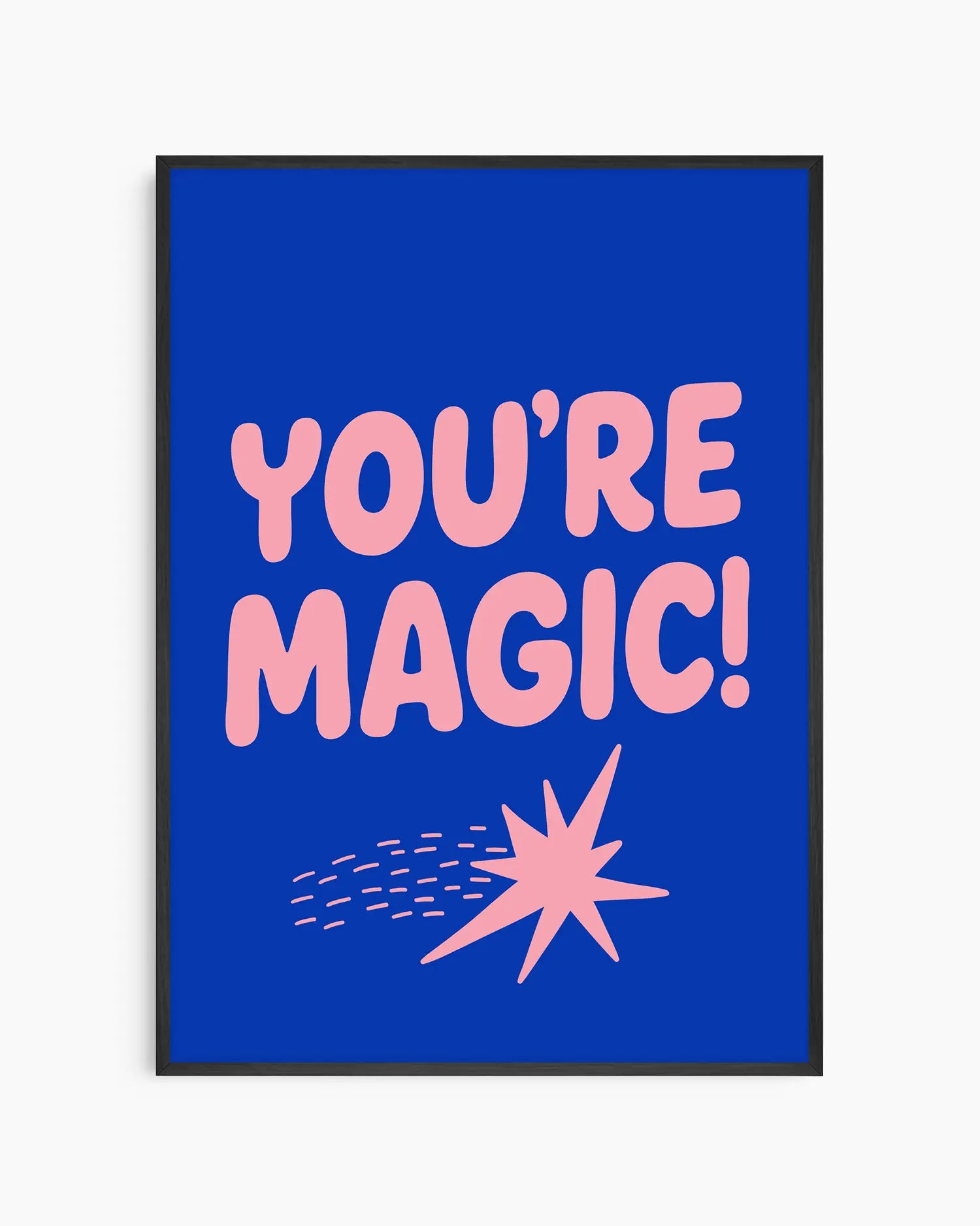 Blue nursery poster with pink text 'YOU'RE MAGIC!' and a shooting star framed in a black frame.