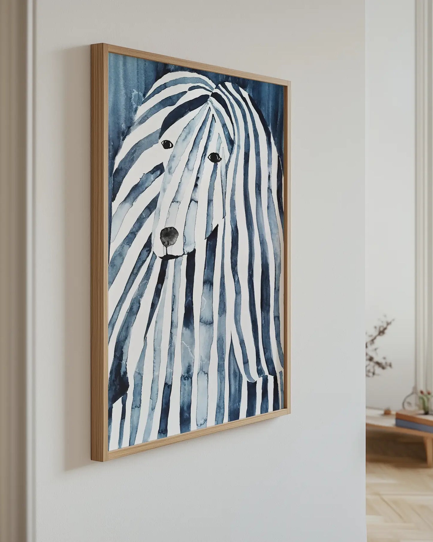 Artwork of an afghan hound with blue and white stripes on a wall.