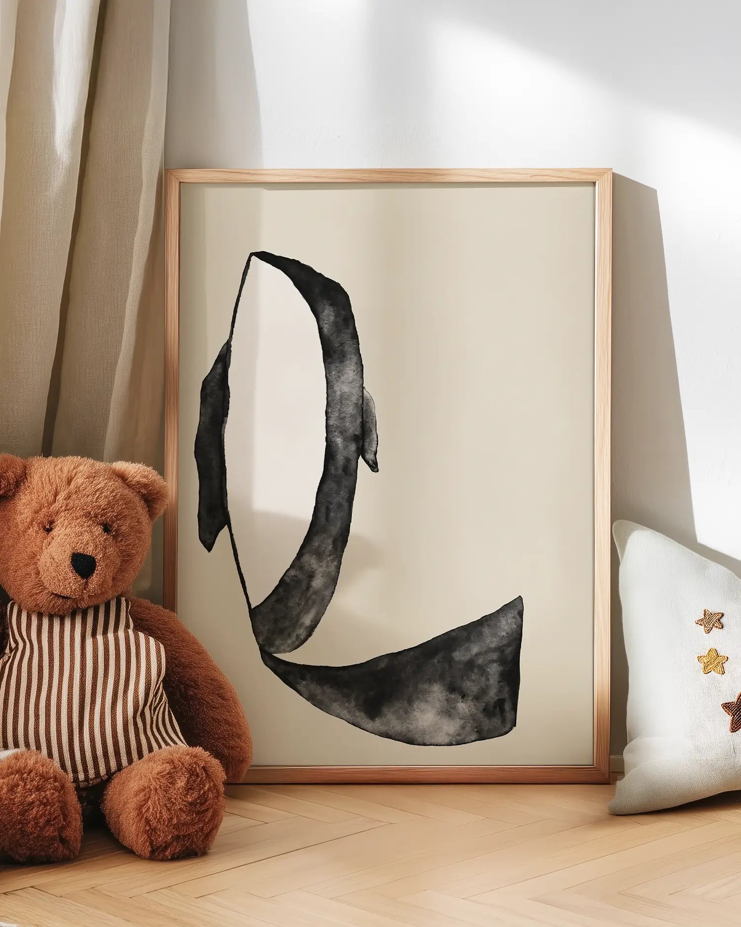 Artwork of an orca with a teddy bear and decorative pillow in the background.