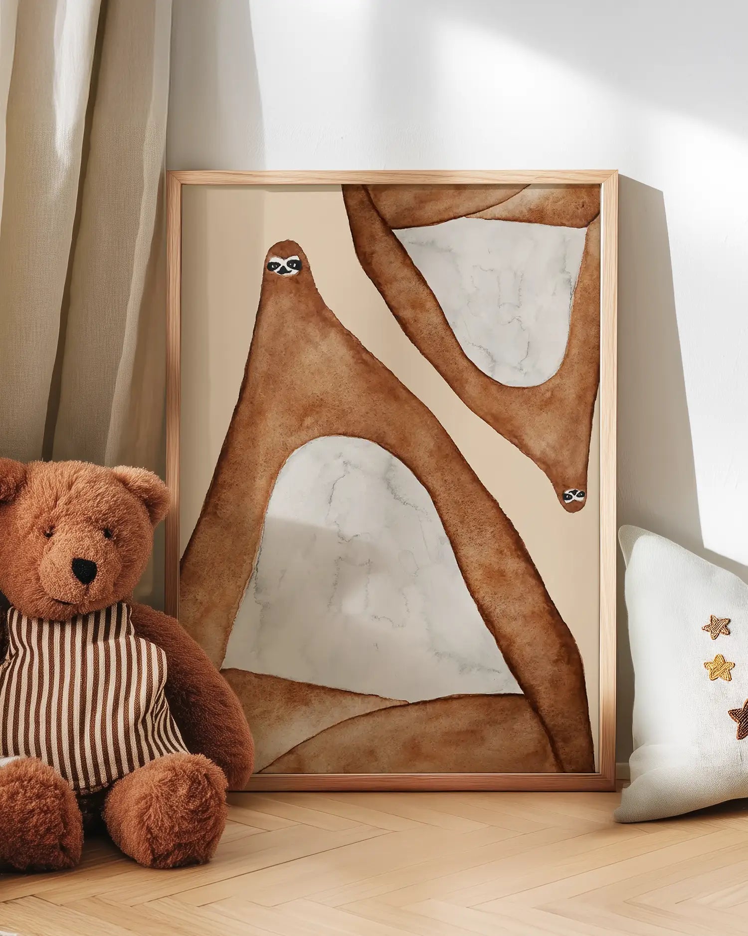 Art piece with two lazy sloths in brown and beige tones with a teddy bear and decorative pillow on a wooden floor.