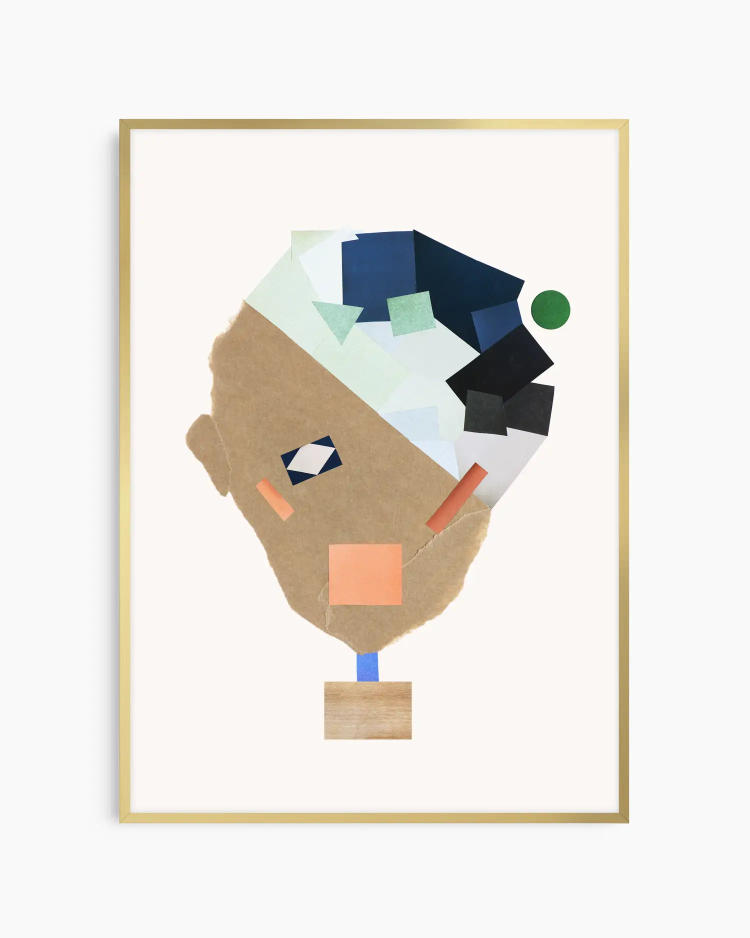 Nursery poster of a collage face made from colorful shapes on a white background framed in a gold frame.