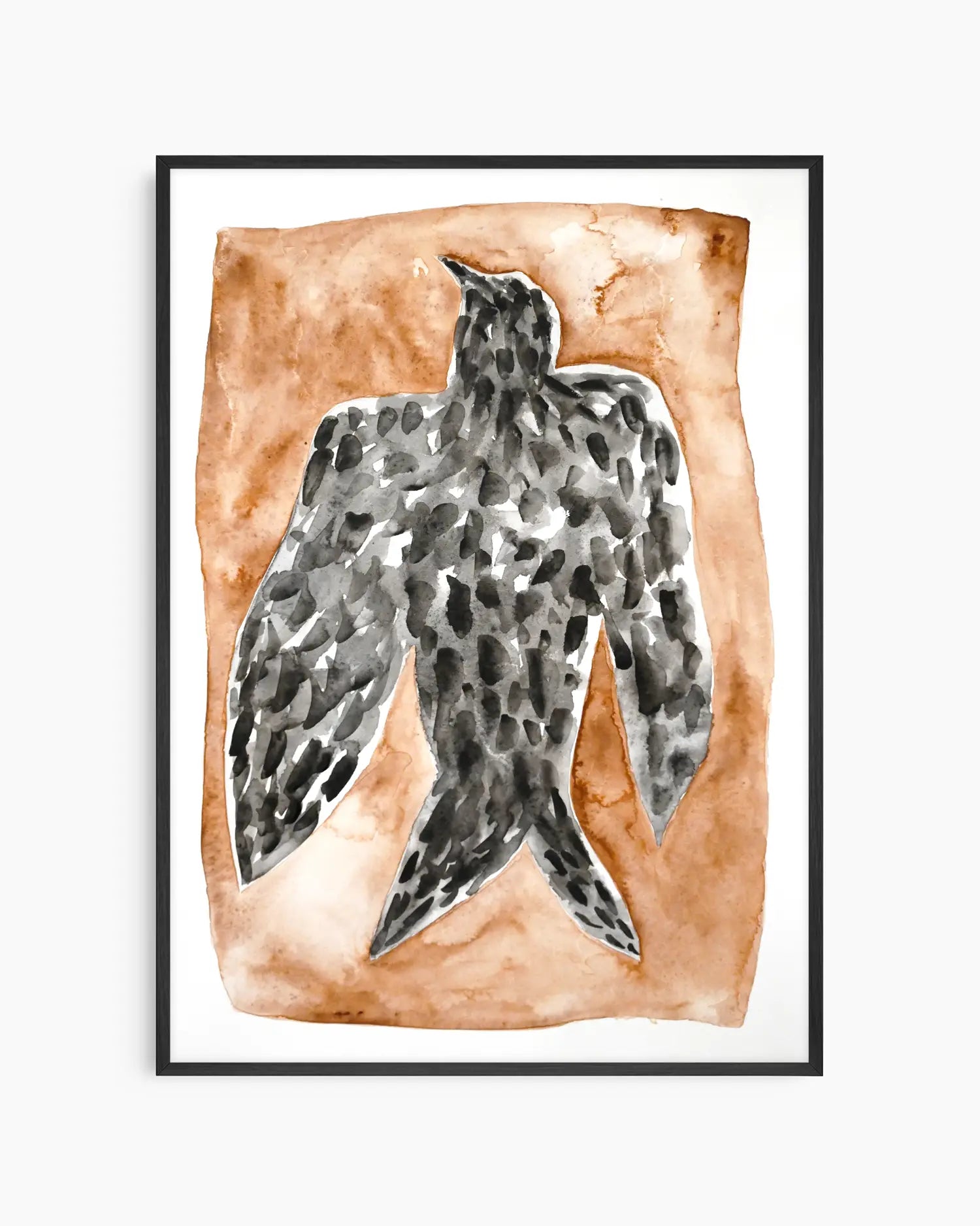 Artwork for the nursery of a black falcon on a brown background framed in a black frame.