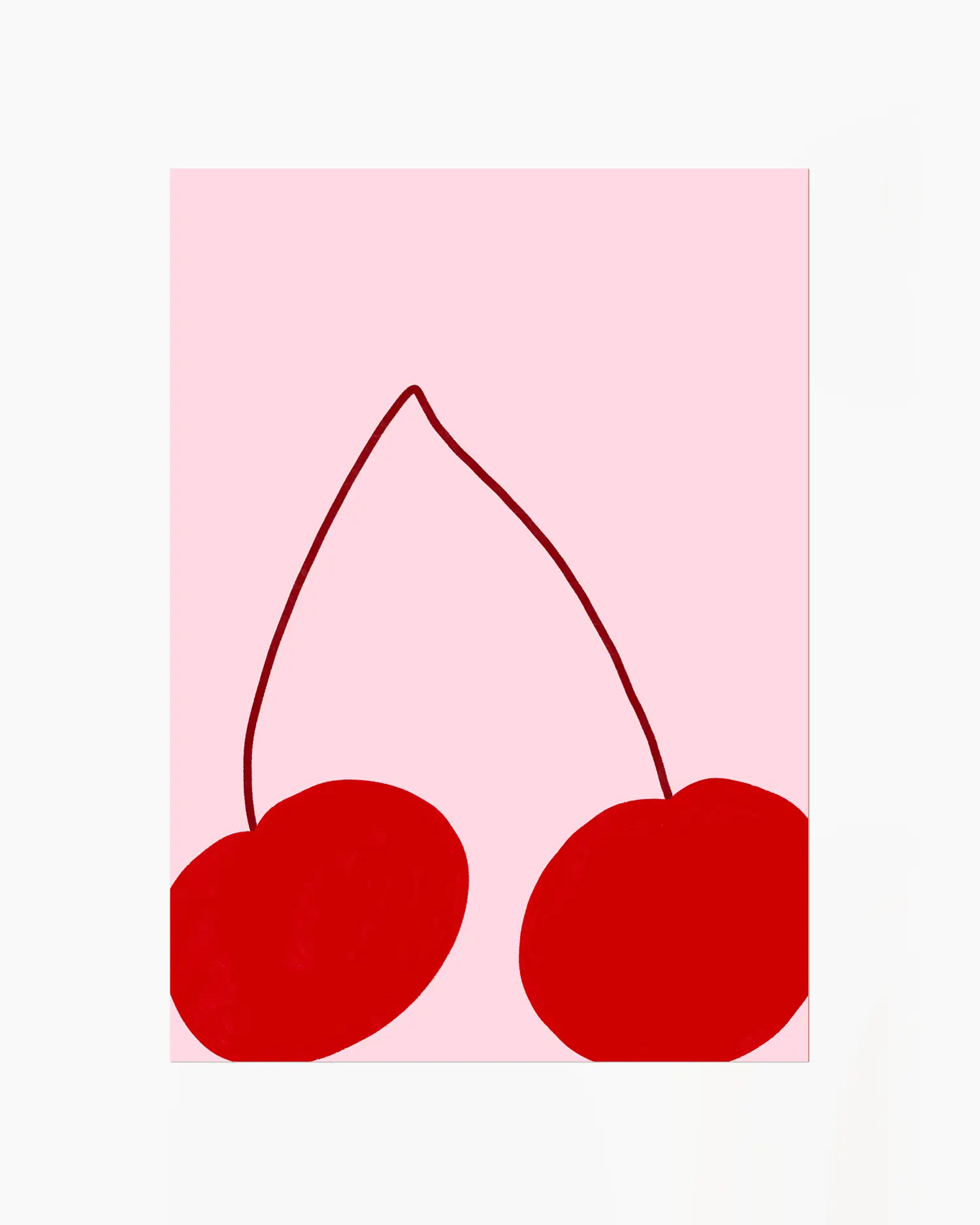 Two red cherries on a pink background