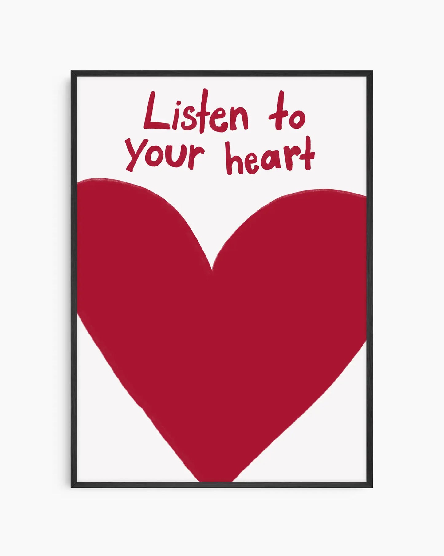 Framed poster with a red heart and 'Listen to your heart' text on a white background