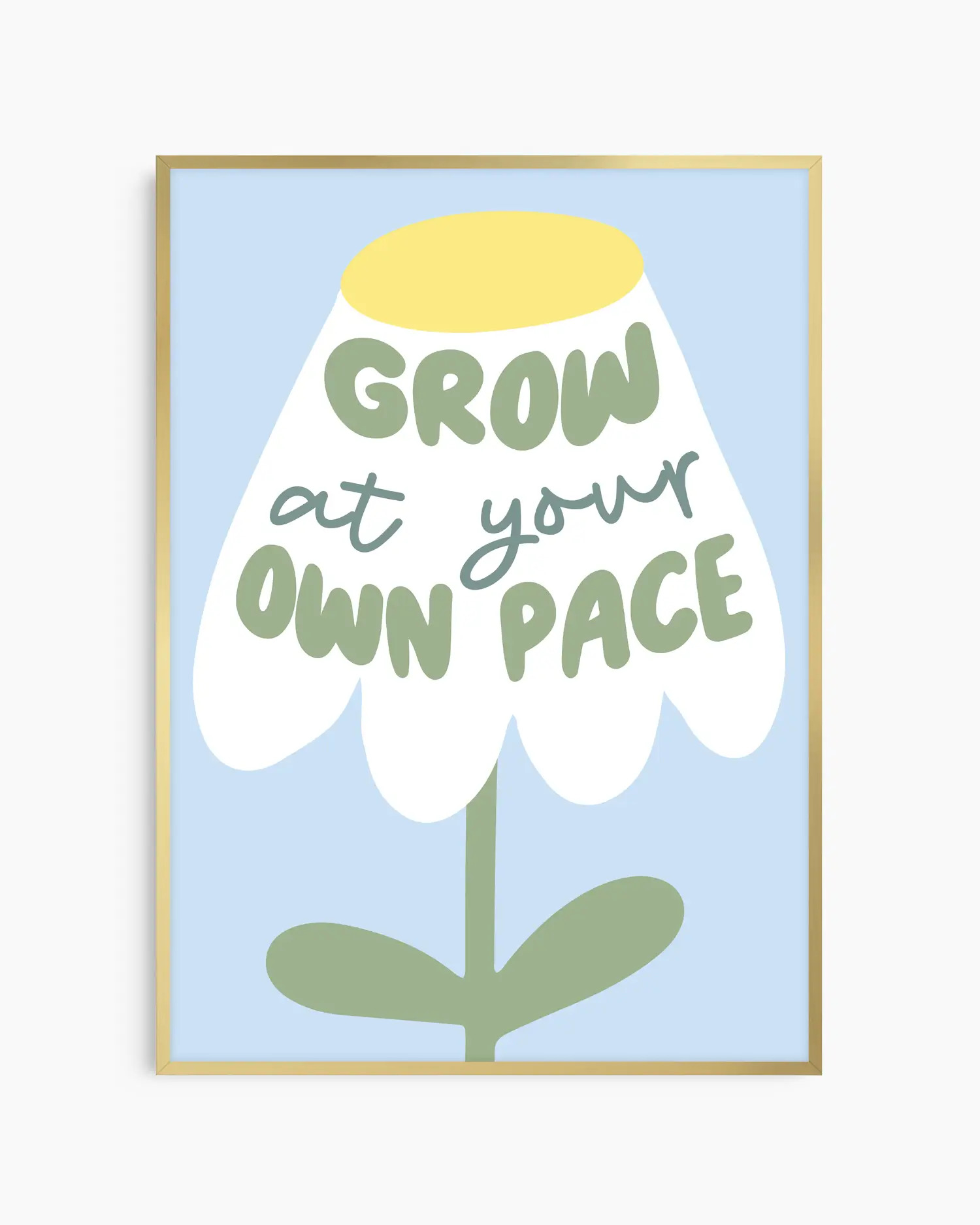 Framed artwork with a flower illustration and text 'Grow at your own pace' on a light blue background.