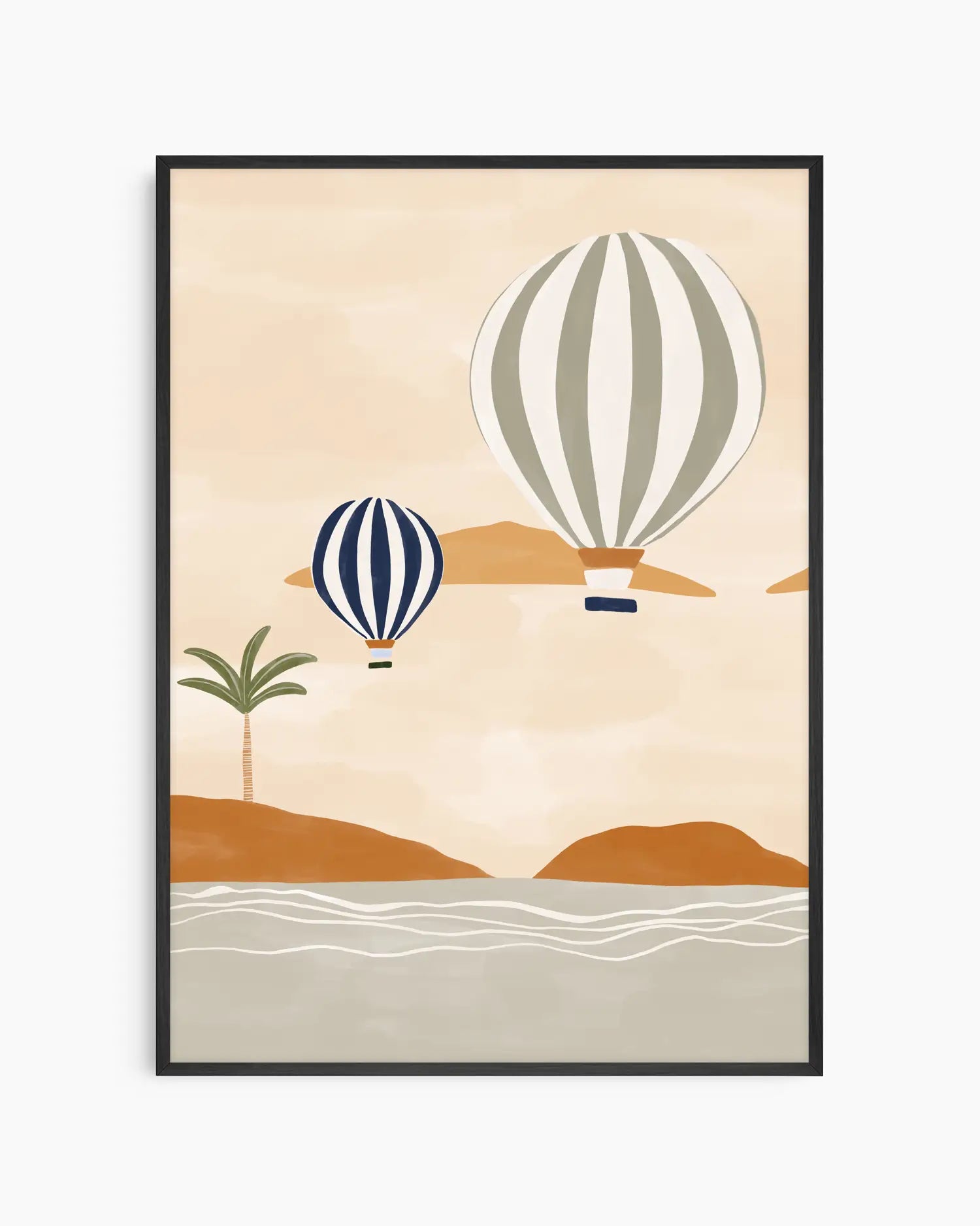 Framed artwork with two hot air balloons over a desert landscape on a beige background