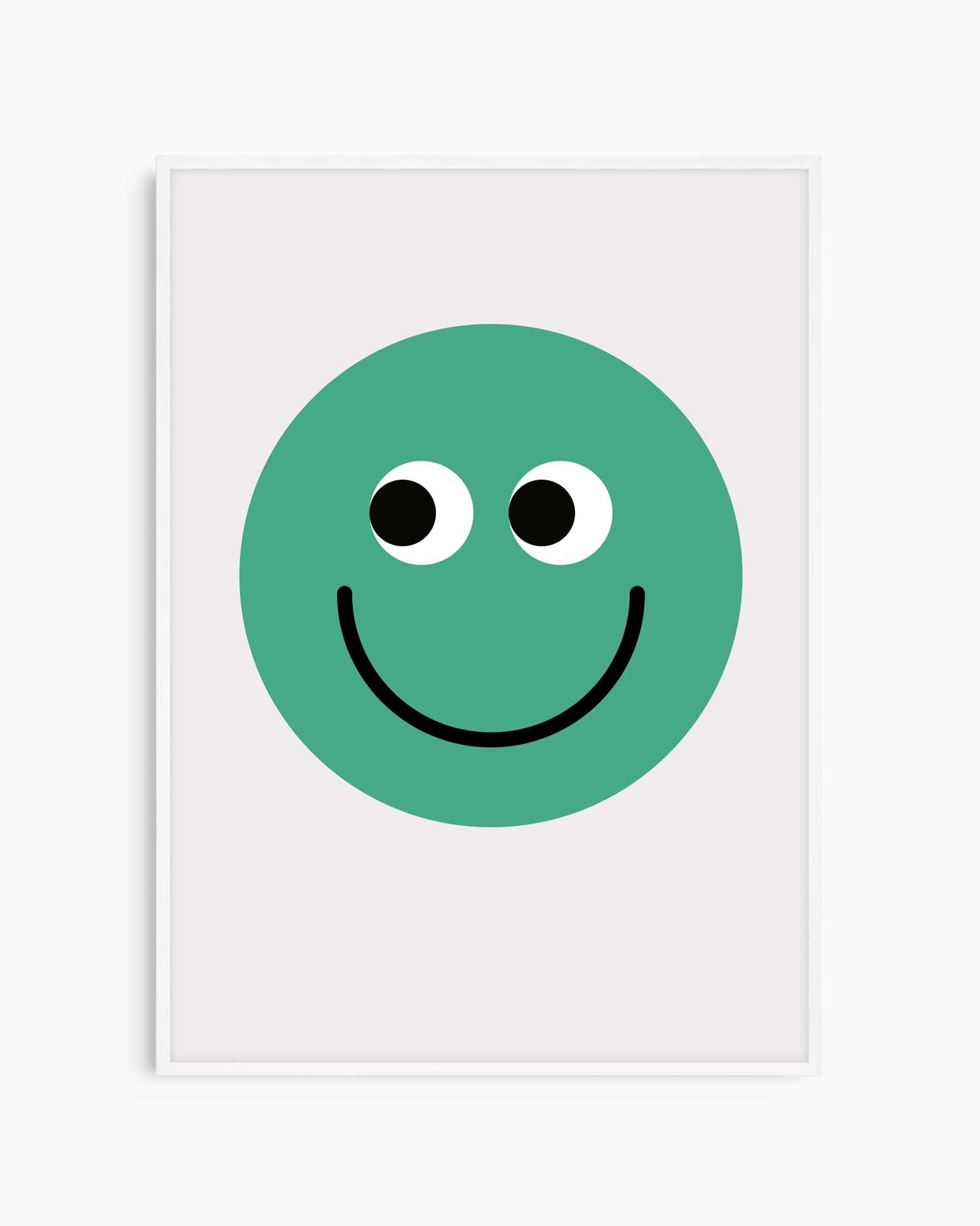 Framed artwork of a green smiley face with a white border on a white background
