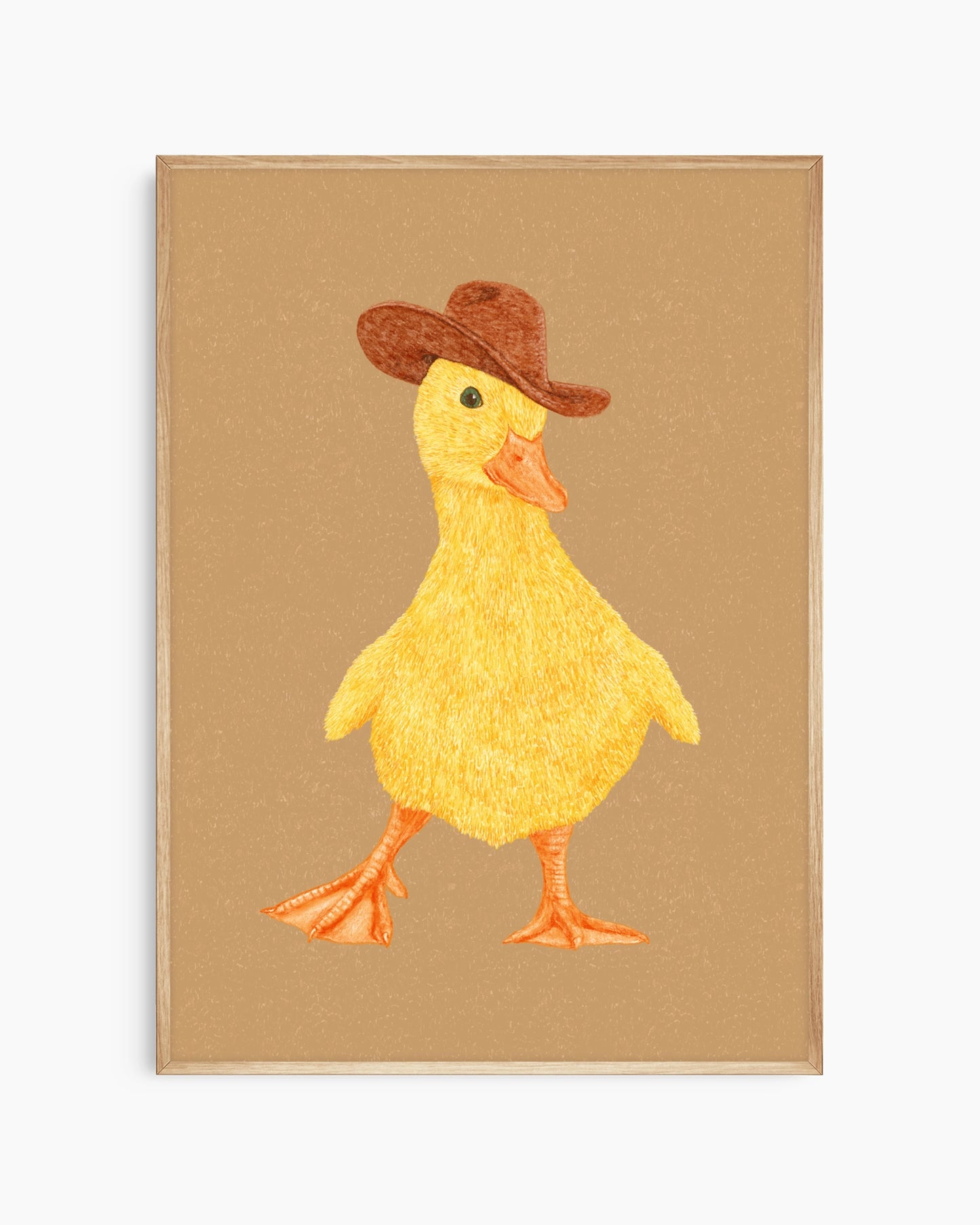 Framed artwork of a yellow duck wearing a brown hat on a beige background