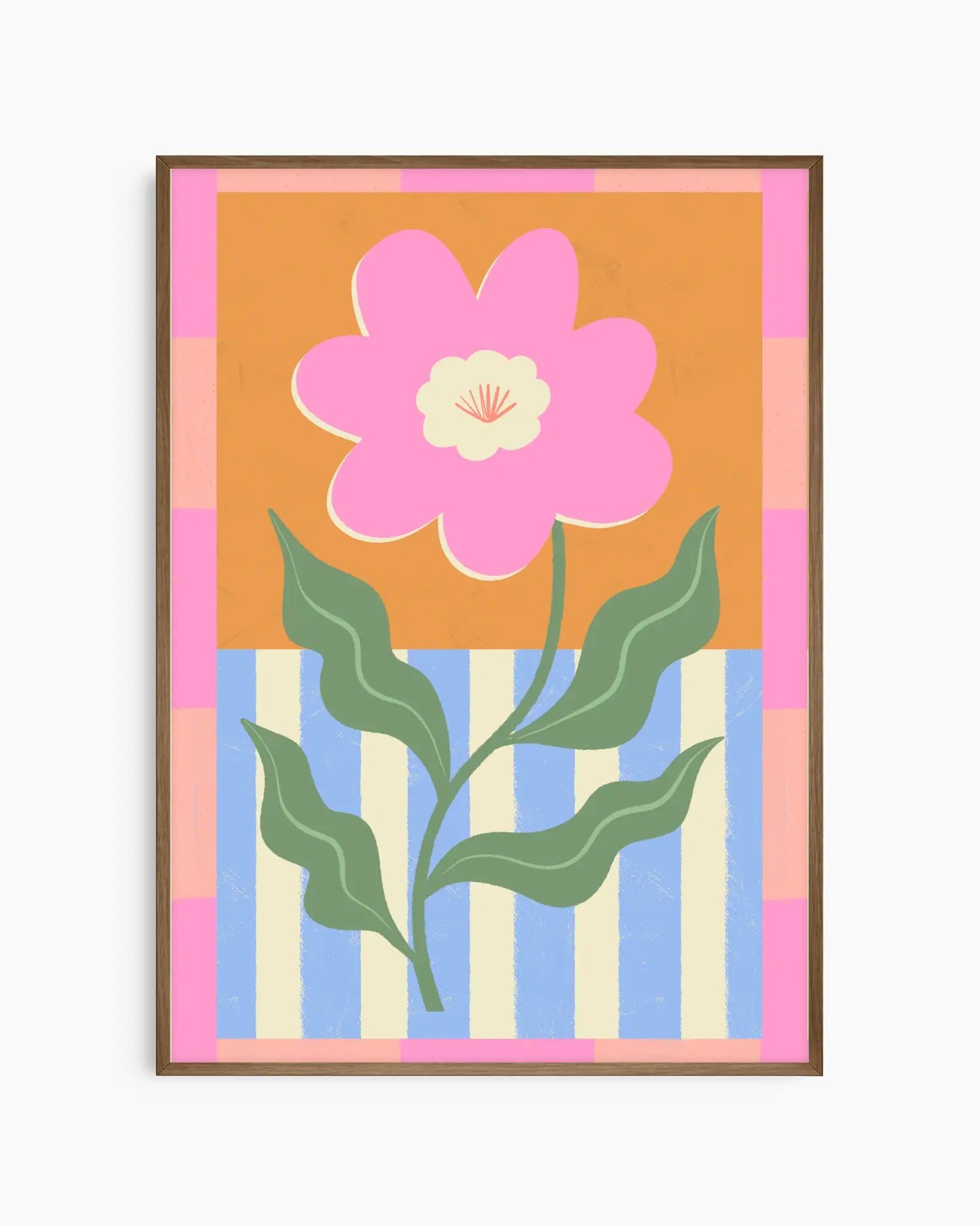 Framed artwork with a pink flower and green leaves on a multicolored striped background.