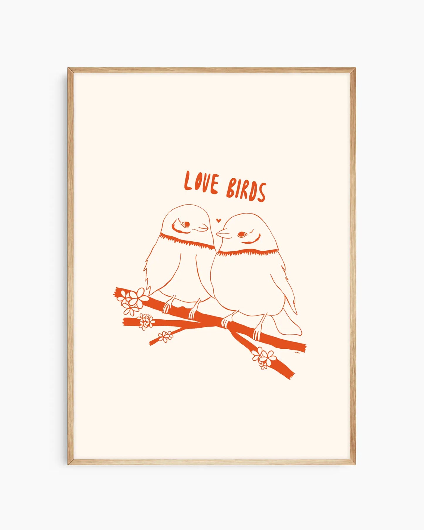 Framed artwork with two birds on a branch and 'Love Birds' text.