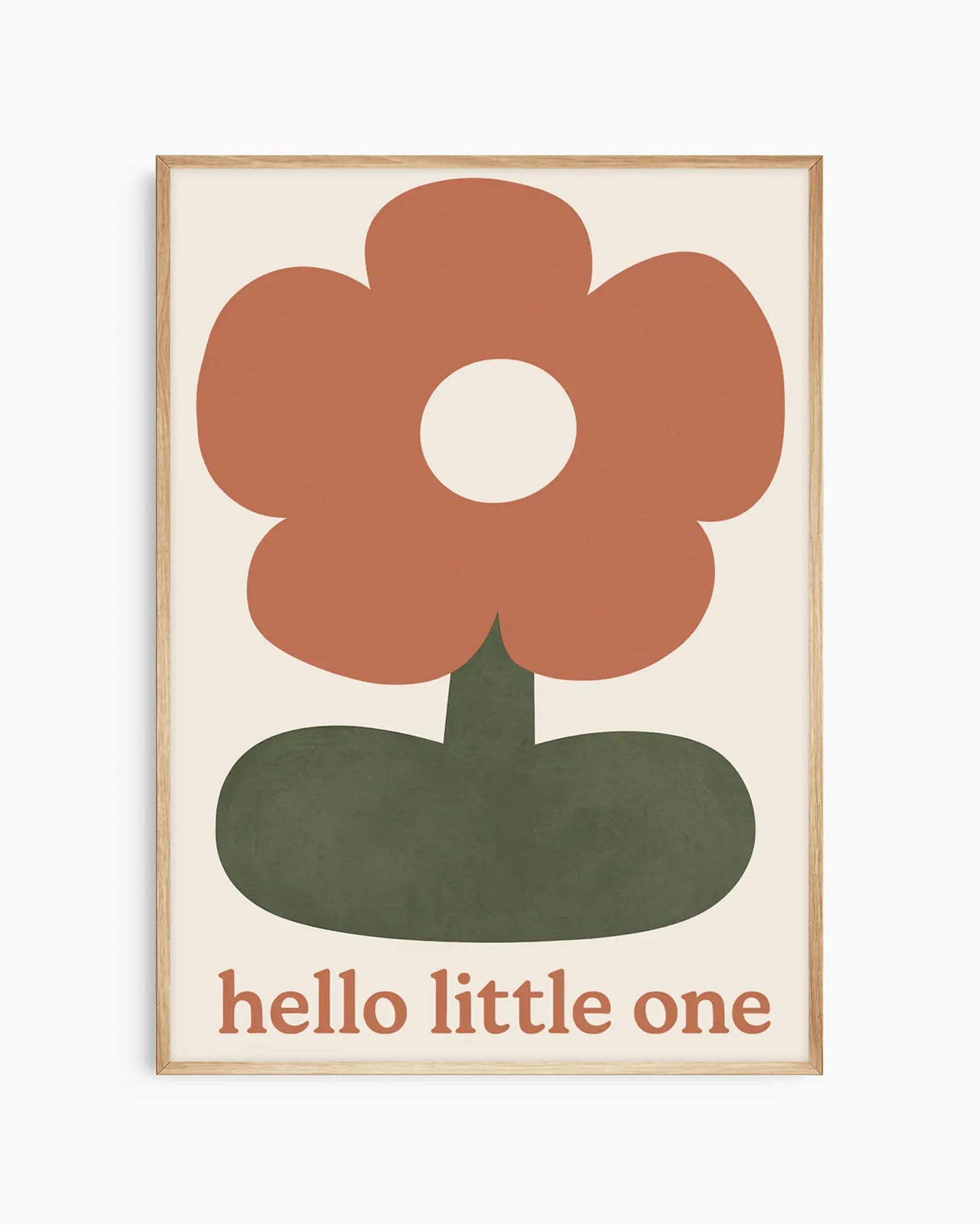 Framed artwork with a red flower and 'hello little one' text on a beige background